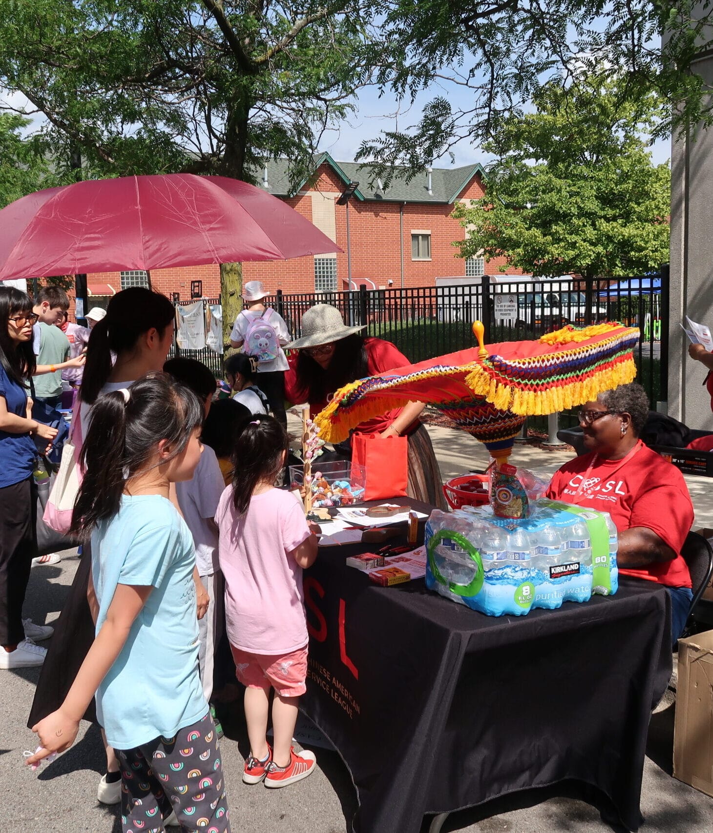 Community members learn about resources at the CASL Block Party